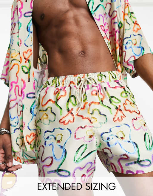 ASOS DESIGN - Pantaloncini da bagno corti con stampa a fiori in coordinato