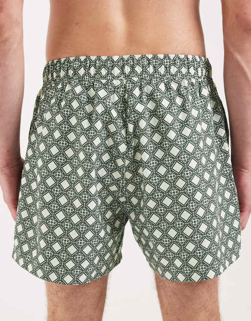 ASOS DESIGN - Pantaloncini da bagno corti verdi con stampa geometrica, 5 di 5