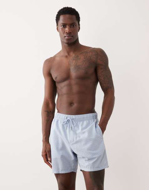 ASOS DESIGN - Pantaloncini da bagno di lunghezza media in tessuto seersucker blu - view 1