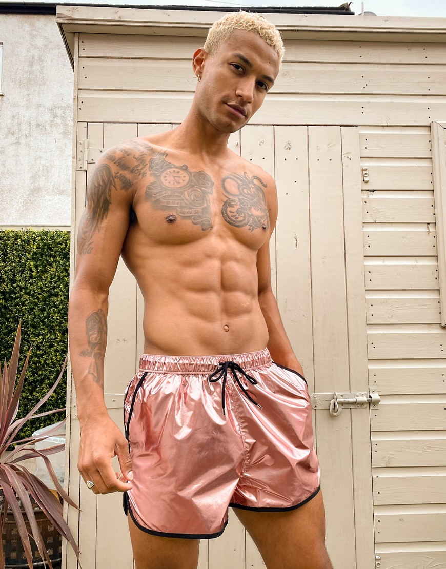 ASOS DESIGN - Pantaloncini da bagno e da corsa oro rosa metallico con profili a contrasto