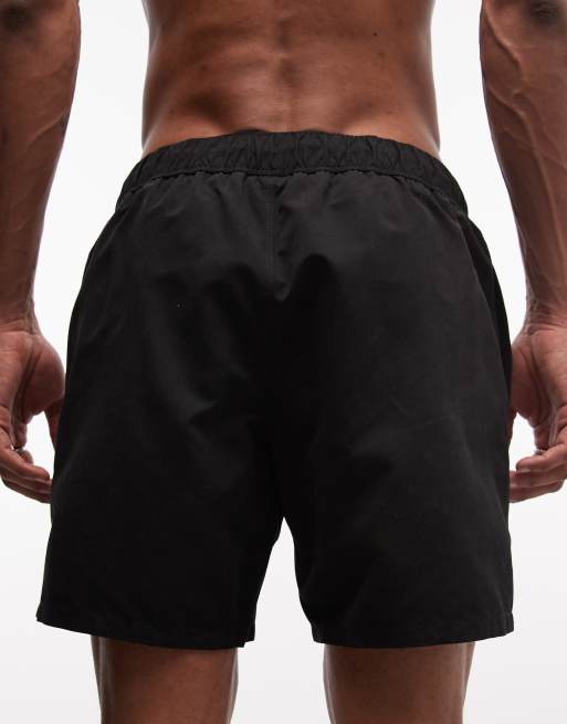 ASOS DESIGN - Pantaloncini da bagno lunghezza media neri con stampa, 4 di 5