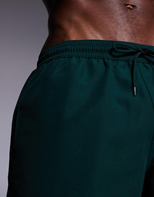 ASOS DESIGN - Pantaloncini da bagno lunghezza media verde scuro, 4 di 4