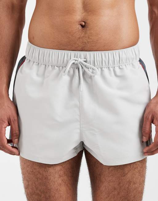 ASOS DESIGN - Pantaloncini da bagno super corti con ricamo sportivo, 4 di 5