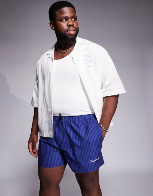 ASOS DESIGN - Pantaloncini da bagno taglio corto blu navy a righe con stampa applicata, 2 di 4