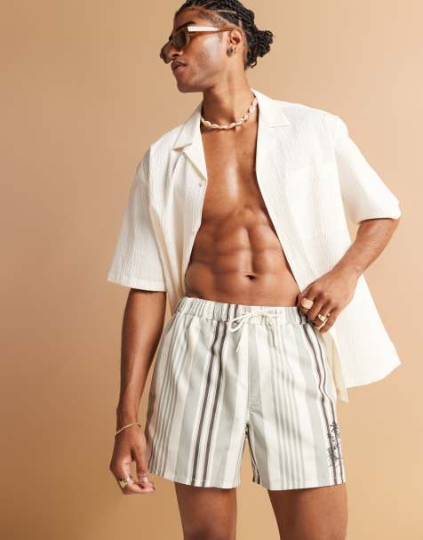 ASOS DESIGN - Pantaloncini da bagno taglio corto crema a righe con stampa applicata - view 1
