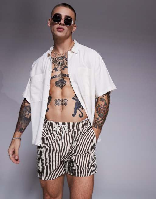 ASOS DESIGN - Pantaloncini da bagno taglio corto in seersucker marrone a righe