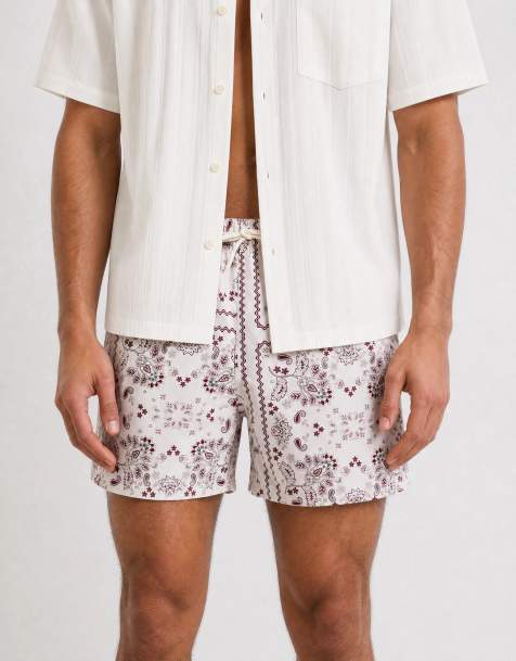 ASOS DESIGN - Pantaloncini da bagno taglio corto neri con stampa cachemire color panna stile bandana - view 1