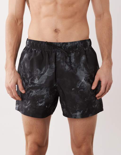 ASOS DESIGN - Pantaloncini da bagno taglio corto neri con stampa cherubino, 4 di 5
