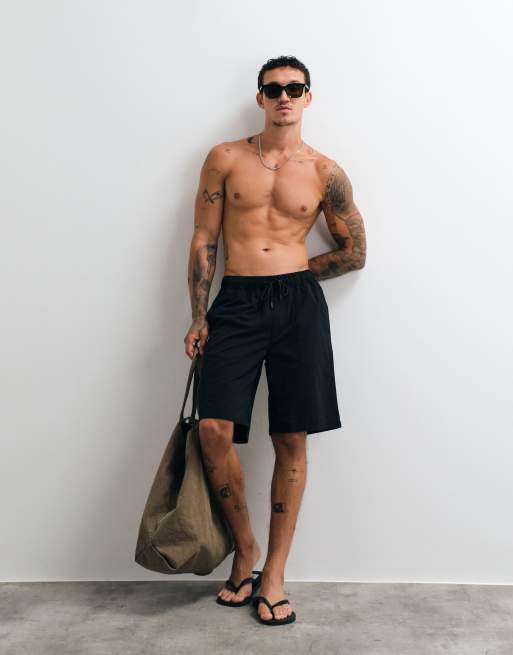 ASOS DESIGN - Pantaloncini da bagno taglio lungo neri, 1 di 5