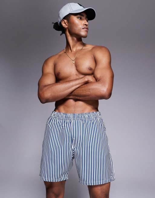 ASOS DESIGN - Pantaloncini da bagno taglio medio a righe color blu navy