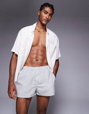 ASOS DESIGN - Pantaloncini da bagno taglio super corto blu a righe - view 1
