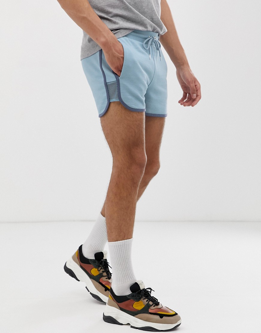 ASOS DESIGN - Pantaloncini da corsa in jersey con pannello a rete blu