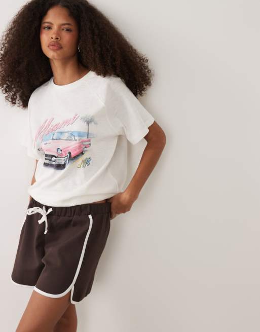 ASOS DESIGN - Pantaloncini da corsa in tessuto interlock color cioccolato con bordi a contrasto, 1 di 5