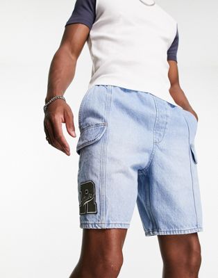 ASOS DESIGN pull on regular length denim cargo shorts with patch in mid wash blue - ASOS Price Checker