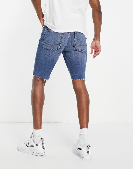ASOS DESIGN - Pantaloncini di jeans dad fit lavaggio medio con fondo grezzo , 2 di 4