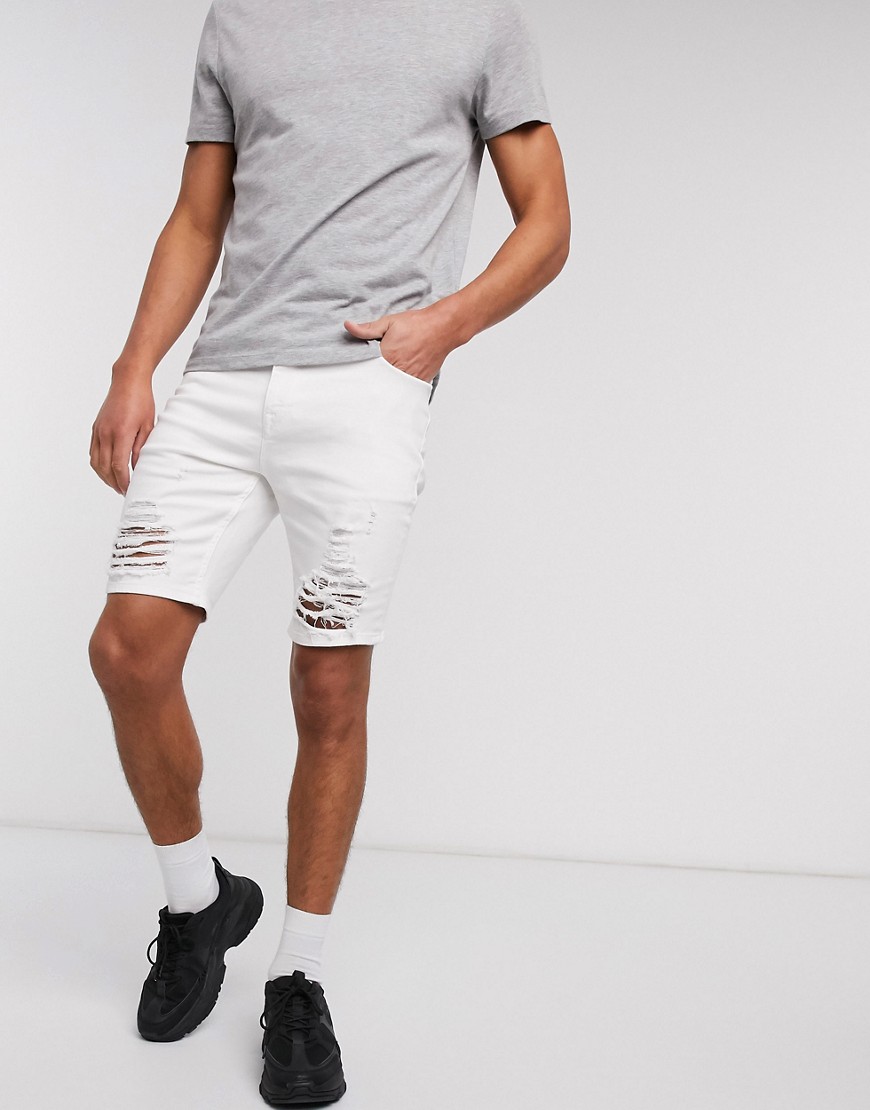 ASOS DESIGN - Pantaloncini di jeans skinny bianchi con strappi effetto smagliato-Bianco