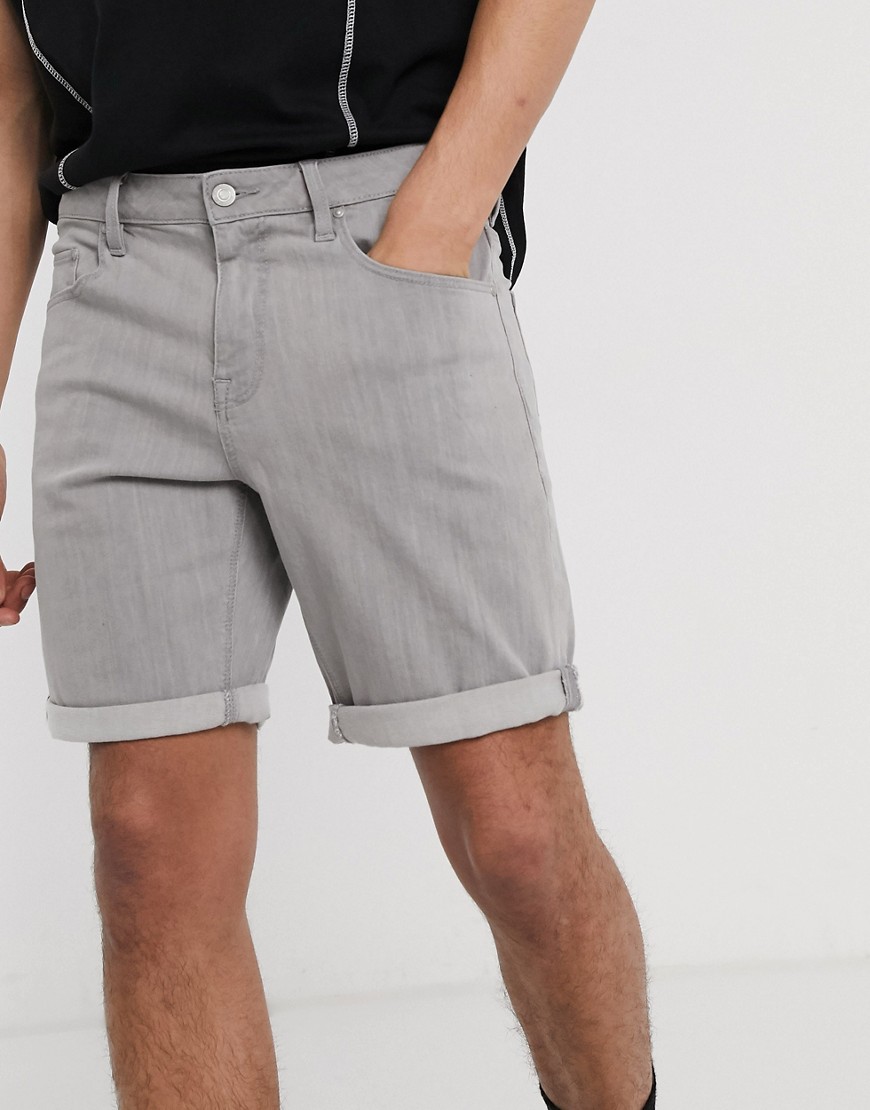 ASOS DESIGN - Pantaloncini di jeans slim grigio slavato