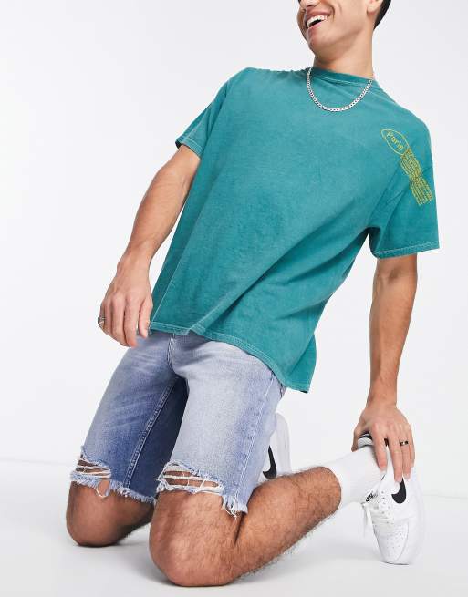 ASOS DESIGN - Pantaloncini di jeans slim lunghezza normale con strappi sul fondo lavaggio blu chiaro, 3 di 4