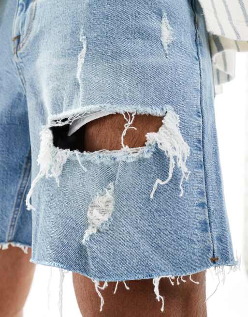 ASOS DESIGN - Pantaloncini di jeans slim taglio medio con strappi lavaggio blu chiaro, 3 di 5