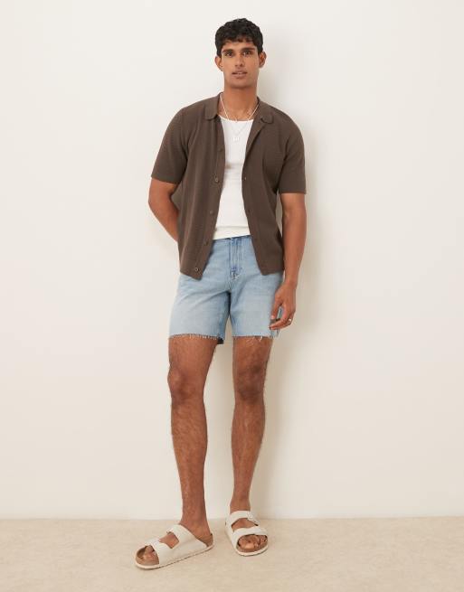 ASOS DESIGN - Pantaloncini di jeans slim taglio medio lavaggio blu chiaro