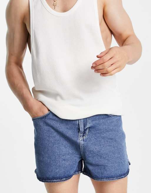 ASOS DESIGN - Pantaloncini di jeans stile runner lavaggio vintage blu scuro