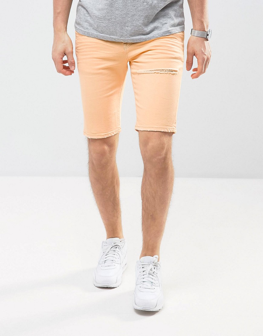 ASOS DESIGN - Pantaloncini di jeans super skinny color pesca con strappi-Arancione
