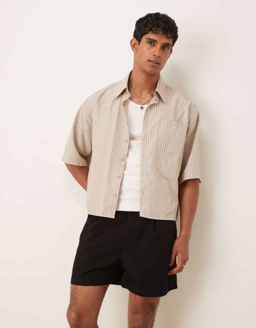 ASOS DESIGN - Pantaloncini di jeans taglio corto neri con pieghe