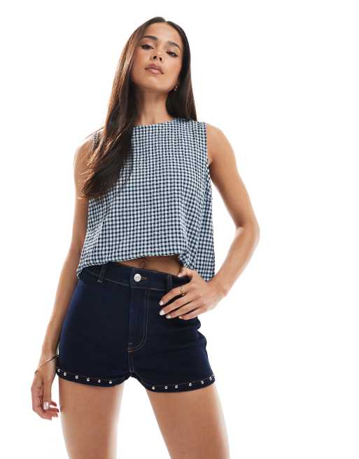 ASOS DESIGN - Pantaloncini micro in denim color indaco con borchie in coordinato