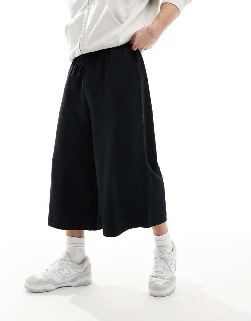 ASOS DESIGN - Pantaloncini neri taglio super lungo