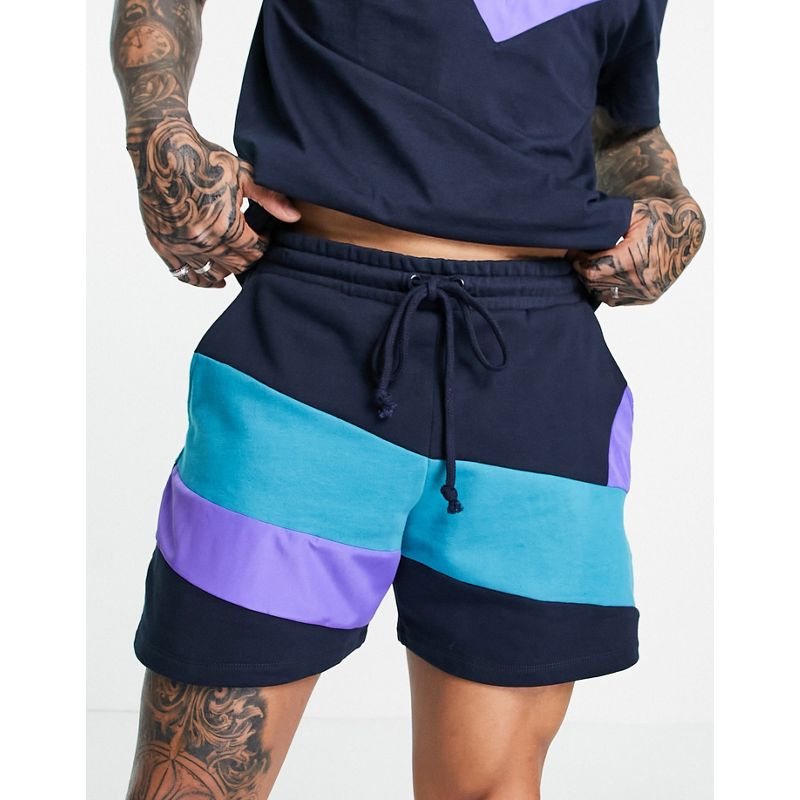  Uomo DESIGN - Pantaloncini oversize con pannelli in nylon color block in stile rétro in coordinato