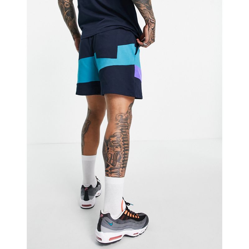  Uomo DESIGN - Pantaloncini oversize con pannelli in nylon color block in stile rétro in coordinato