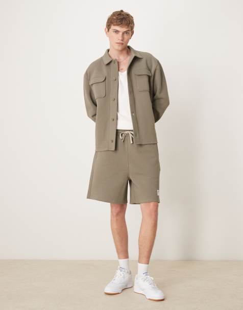 ASOS DESIGN - Pantaloncini oversize con toppa e orlo grezzo kaki in coordinato - view 1