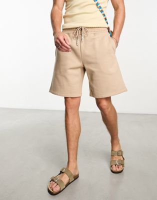 ASOS DESIGN heavyweight oversized jersey shorts in beige - ASOS Price Checker