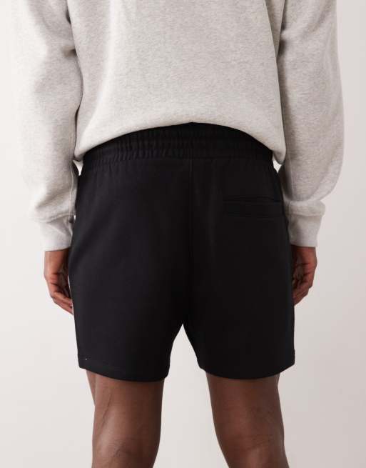 ASOS DESIGN - Pantaloncini slim taglio corto in jersey neri con profili laterali a contrasto, 4 di 5