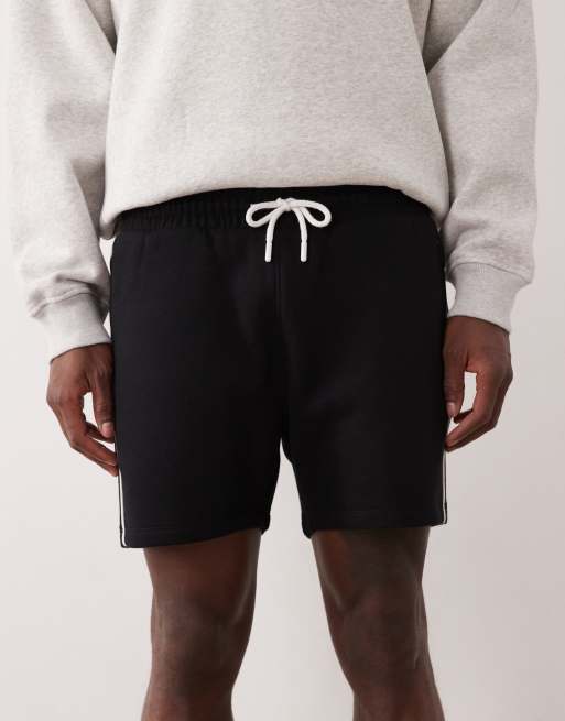 ASOS DESIGN - Pantaloncini slim taglio corto in jersey neri con profili laterali a contrasto, 5 di 5