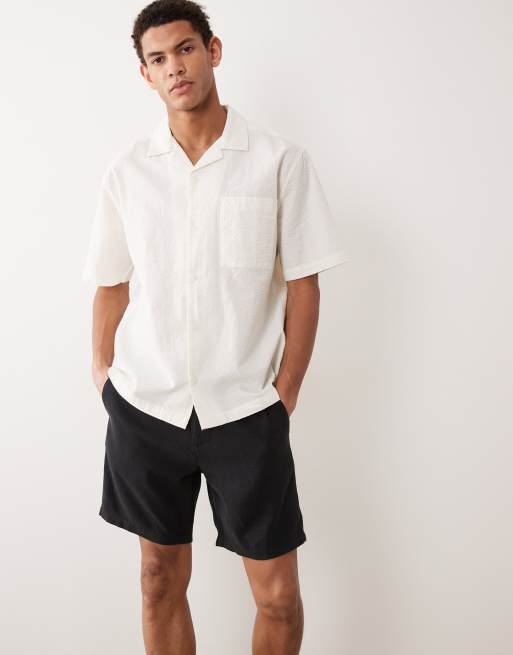 ASOS DESIGN - Pantaloncini slim taglio medio in misto lino nero