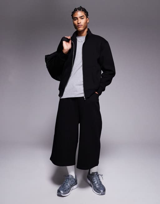 ASOS DESIGN - Pantaloncini taglio lungo neri oversize in coordinato