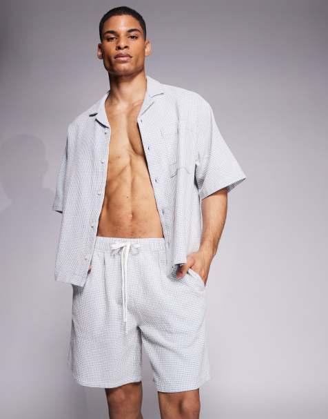 ASOS DESIGN - Pantaloncini taglio medio blu e bianchi a nido d'ape in coordinato - view 1