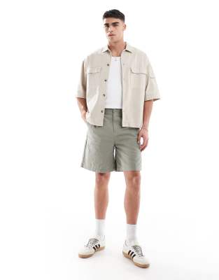 ASOS DESIGN - Pantaloncini taglio medio in misto lino color kaki - view 1