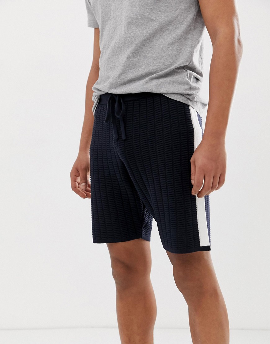 ASOS DESIGN - Pantaloncini testurizzati in maglia blu navy con righe laterali