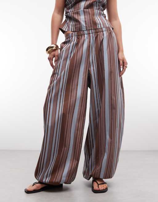 ASOS DESIGN - Pantalones a rayas azules y marrones de corte bombacho sin cierres de mezcla de algodón y nailon, 2 de 5