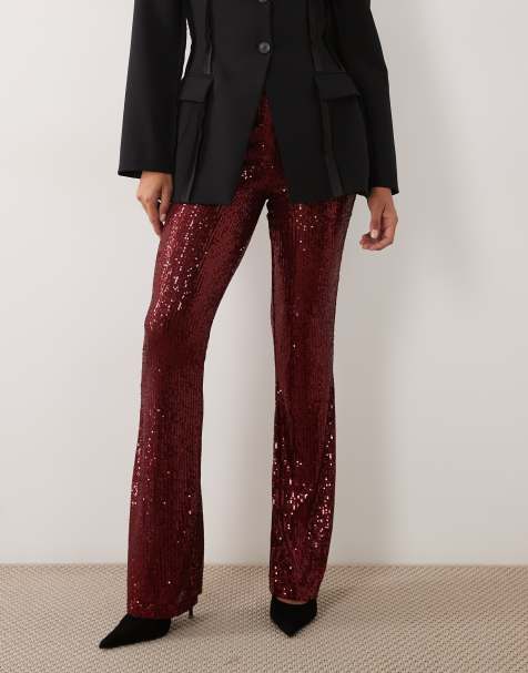 ASOS DESIGN pantalones acampanados con lentejuelas en color baya - view 1