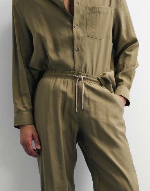 ASOS DESIGN - Pantalones caquis de corte tapered holgado (parte de un conjunto), 2 de 7
