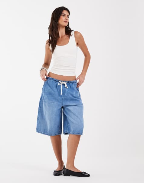 ASOS DESIGN - pantalones cortos bermuda vaqueros holgados con detalle de cintura anudada en azul medio - view 1