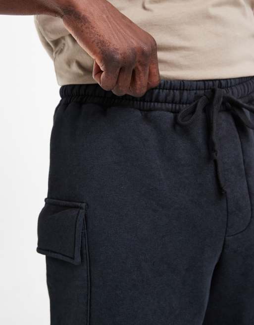 ASOS DESIGN - Pantalones cortos cargo negro lavado de corte slim de punto liso, 3 de 5