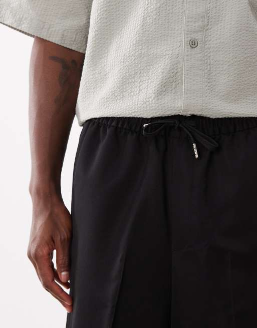 ASOS DESIGN - Pantalones cortos de sastre negros estilo bermudas sin cierres, 4 de 5