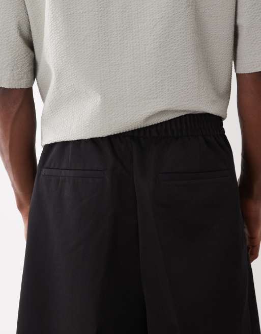 ASOS DESIGN - Pantalones cortos de sastre negros estilo bermudas sin cierres, 5 de 5