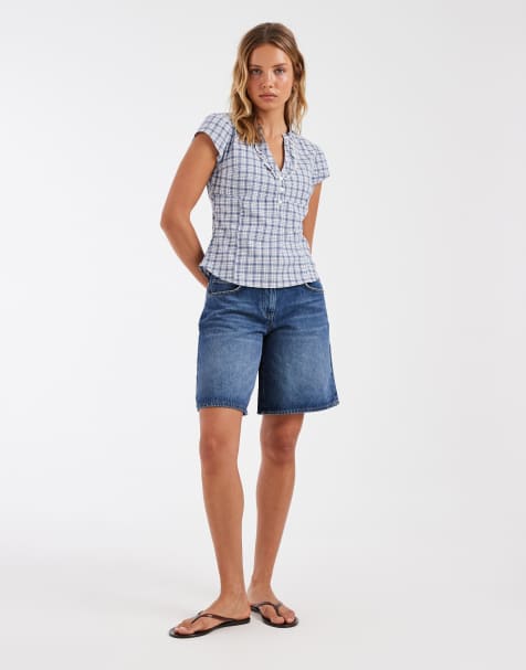ASOS DESIGN - Pantalones cortos de talle bajo estilo bermudas con lavado medio - view 1