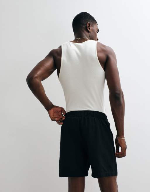 ASOS DESIGN - Pantalones cortos negros de largo medio de tejido texturizado (parte de un conjunto), 3 de 5