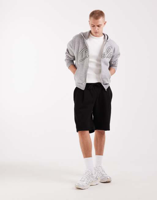 ASOS DESIGN - Pantalones cortos negros sueltos de punto liso, 2 de 5